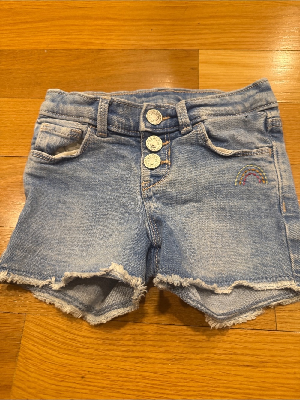 Old Navy girls   with rainbow Jean shorts size 4t .